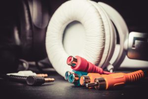 Headphones,On,Black,Background.,Selective,Focus.,Color,Toned.
